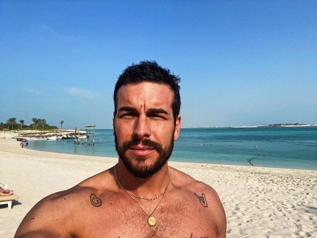 Mario Casas as seen while taking a shirtless beach selfie in Abu Dhabi, United Arab Emirates in February 2020