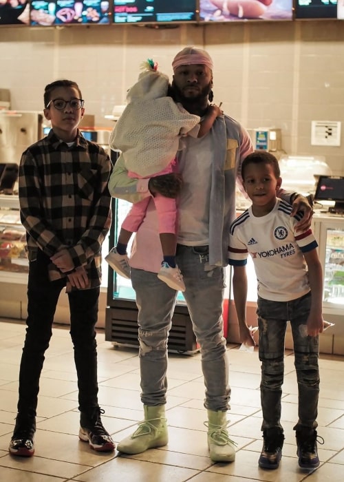 Montana of 300 as seen in a picture taken with his son Tony Bradford and his daughter and youngest son on the day of his birthday in March 2020