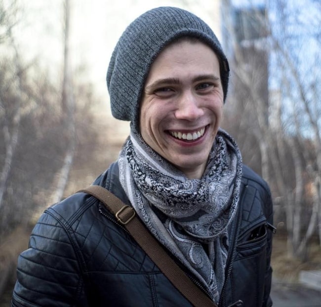 Owen Teague as seen while smiling for the camera in March 2019