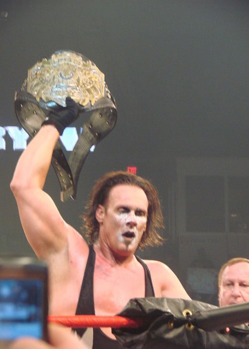 Professional wrestler Sting with the TNA World Heavyweight Championship at Bound for Glory on October 12, 2008