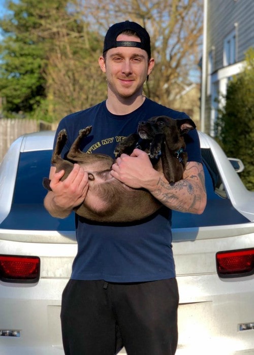 Ryan Abe with his dog as seen in February 2020