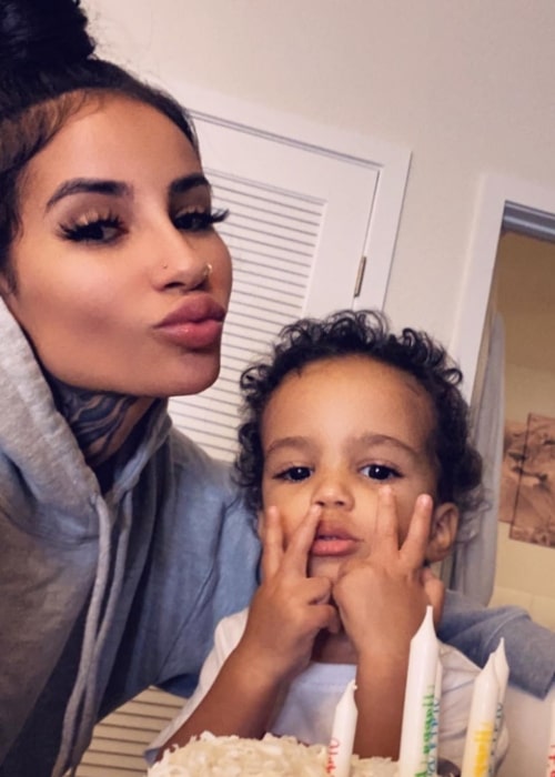 Aggy Abby as seen while pouting in a selfie alongside her son in February 2020