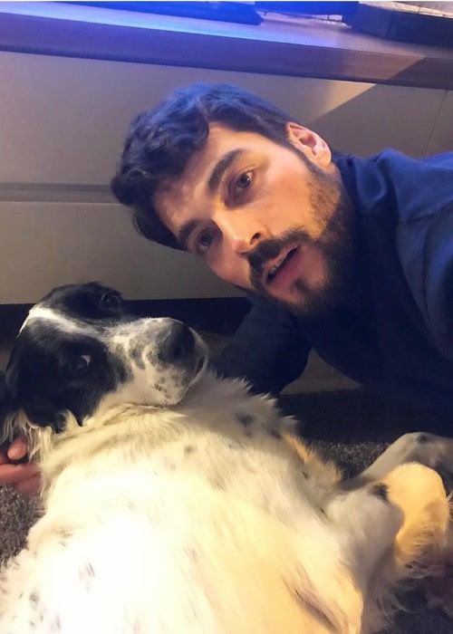 Akin Akinozu with his dog as seen in April 2019