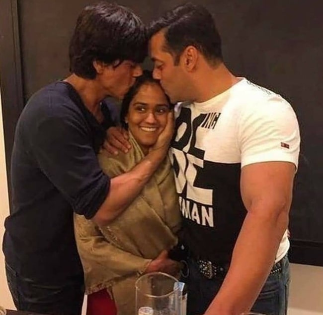 Arpita Khan being hugged by Shahrukh Khan and Salman Khan in March 2020