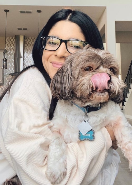 AshleyTheUnicorn as seen in a picture taken with her dog in October 2019
