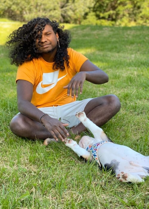 Baker Boy as seen in a picture taken in April 2020, while playing with his dog Djapa