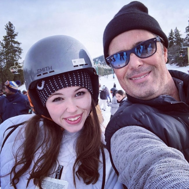 Carlos Bernard as seen while taking a selfie alongside his daughter in December 2019