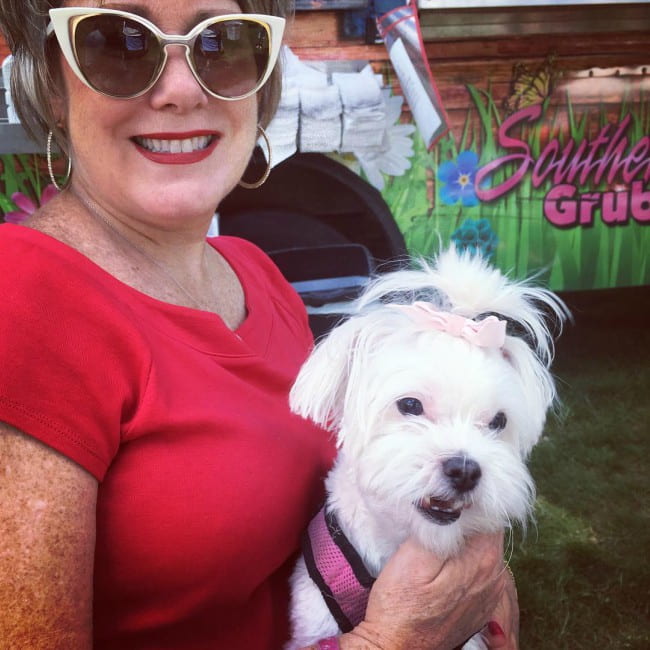 Cathy Nesbitt-Stein with her dog as seen in August 2017