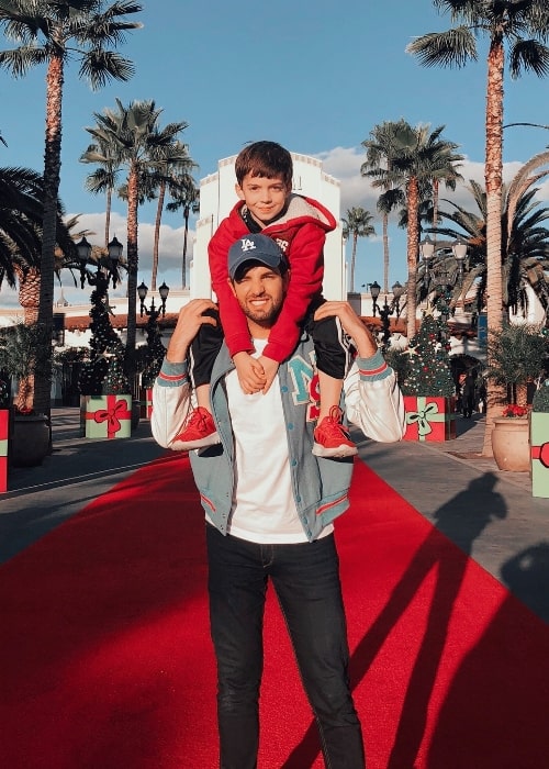 Daniel Preda as seen while posing for a picture along with his nephew at Universal Studios Hollywood in December 2019