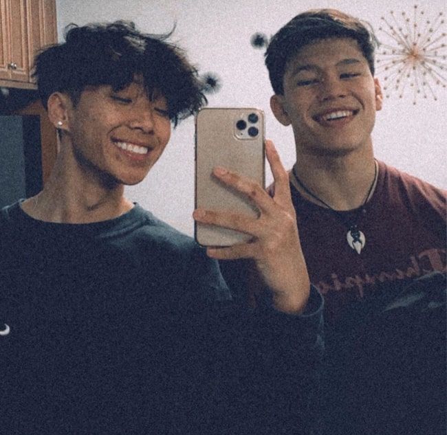 Devin Bui clicking a mirror selfie alongside Niko Katsuyoshi in March 2020