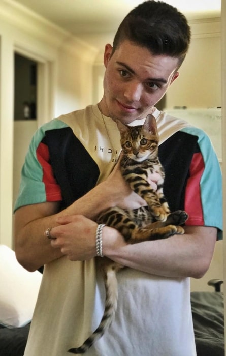 FaZe Adapt as seen while posing for the camera along with his furry friend in October 2017