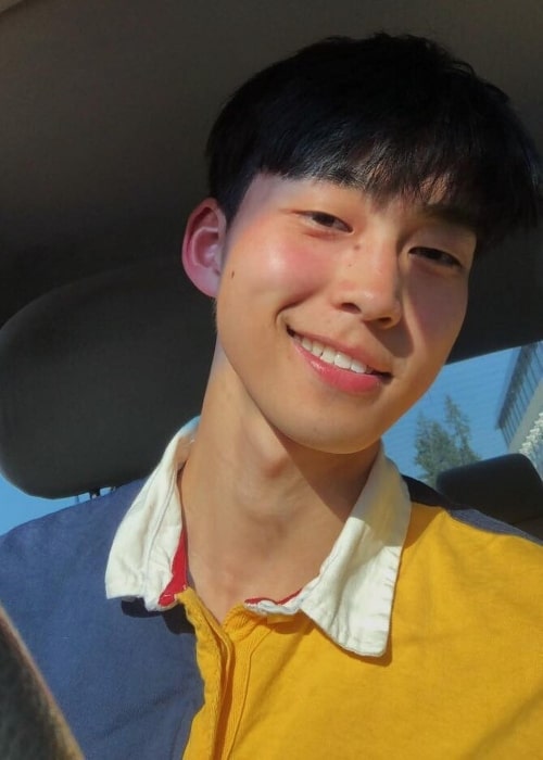 Freddie Liu as seen while smiling in a car selfie in May 2019