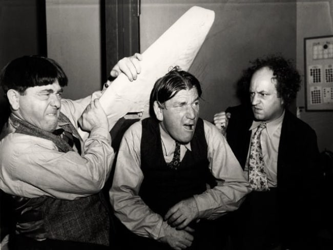 From Left to Right - Moe Howard, Shemp Howard, and Larry Fine (The Three Stooges) in a publicity still for 'Sing a Song of Six Pants' in 1947