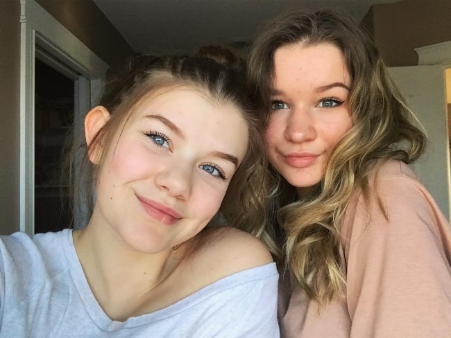 Holly Westlake clicking a selfie alongside her friend Maya in February 2018