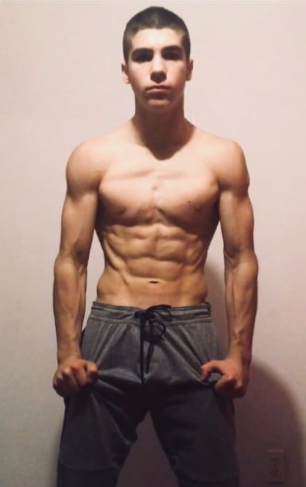 Joe Albanese showing his ripped physique in a shirtless picture in September 2018