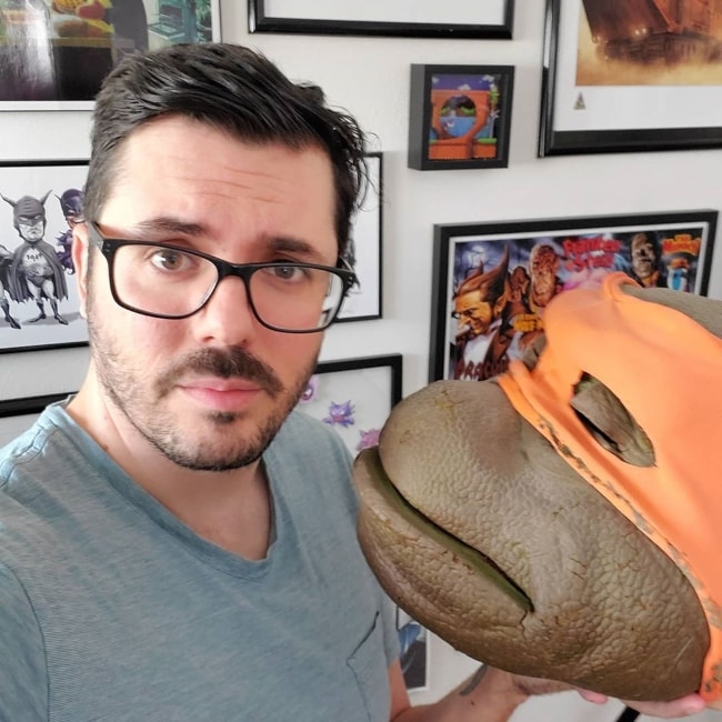 Joshua Ovenshire as seen in a selfie taken with his original Michaelangelo mask from the film Teenage Mutant Ninja Turtles (2014) in March 2020