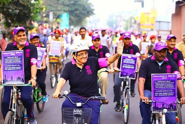 Kiran Bedi leading a cycle rally on International Women's Day in 2018