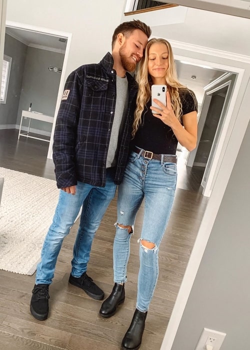 Maddie Lymburner clicking a mirror selfie alongside Kyle Fraser in November 2019