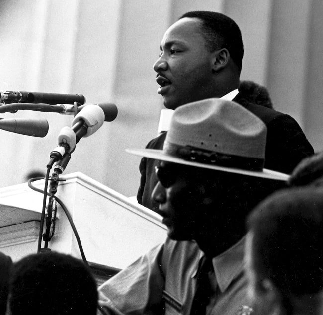 Martin Luther King Jr. pictured while delivering his most famous speech, 'I Have a Dream', before the Lincoln Memorial during the 1963 March on Washington for Jobs and Freedom