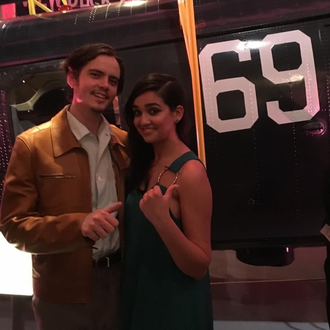 Miles Robbins posing for a picture alongside Geraldine Viswanathan at Intrepid Sea, Air & Space Museum in New York City in August 2018