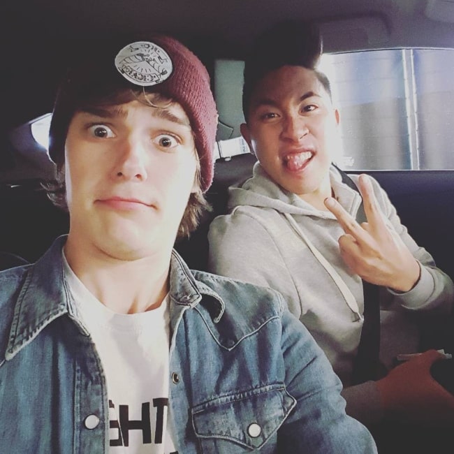 Mitchell Hope taking a car selfie along with Daniel J C Puckey in August 2015