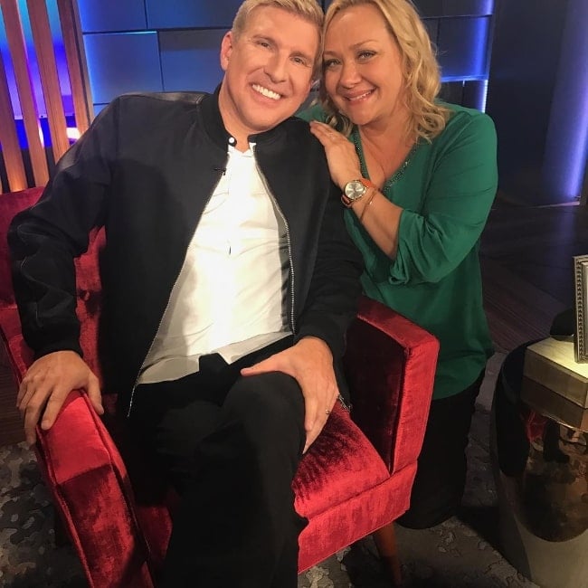 Nicole Sullivan posing for a picture alongside Todd Chrisley in May 2017