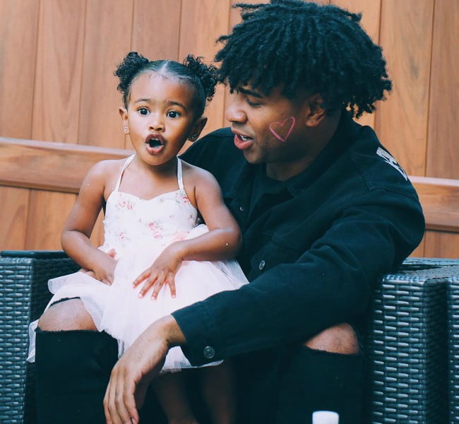 Prettyboyfredo with his daughter as seen in November 2019