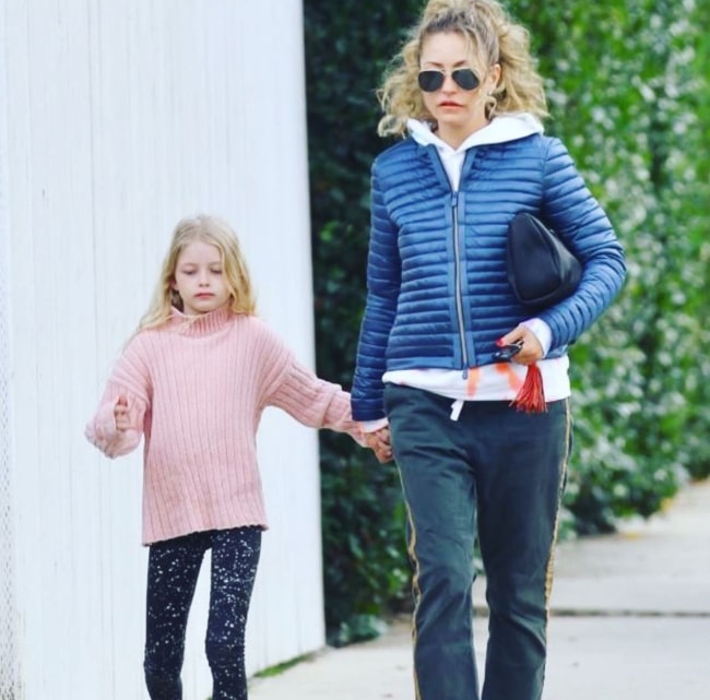 Rebecca Gayheart in January 2020, walking with her 8-year-old daughter who will still hold her hand