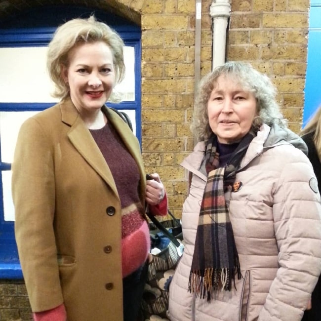 Sara Stewart (Left) as seen while smiling for a picture alongside Brigitte Uhrmann in February 2019