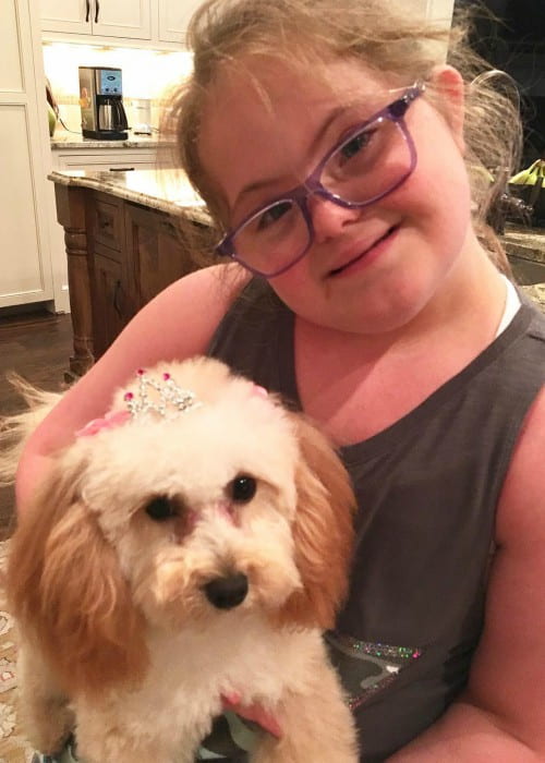 Sarah Grace Morris with her dog as seen in August 2017