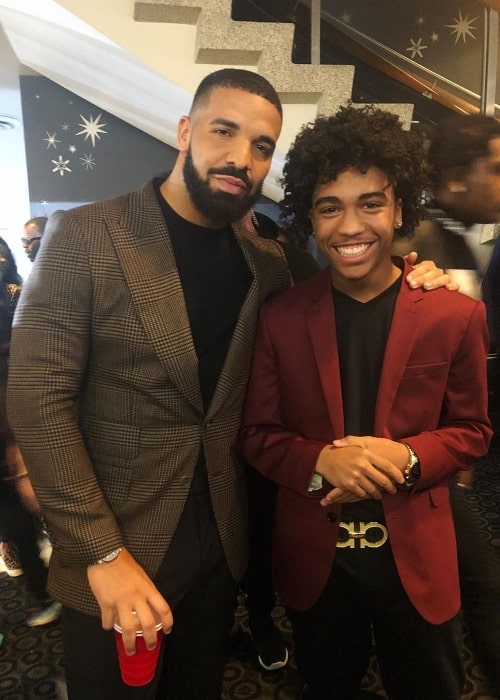 Tristan Timmons (Right) posing for a picture alongside Drake in June 2019