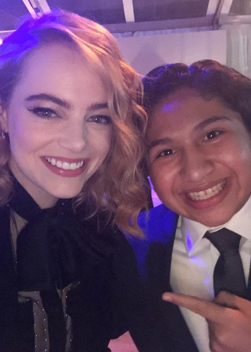 Anthony Gonzalez as seen while smiling in a picture alongside Emma Stone at the WME party in Beverly Hills, California in March 2018