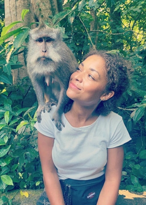 Antonia Thomas in a picture taken with a monkey in April 2019