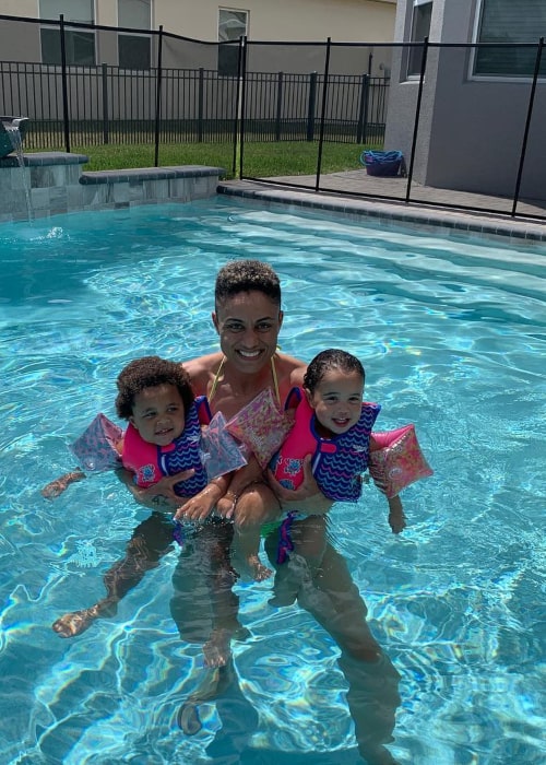 Candice Dupree with her twin daughters, as seen in May 2018