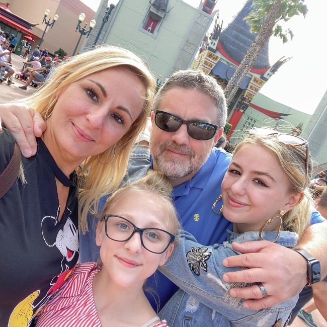 Christi Lukasiak as seen in a selfie taken with her husband Marc Lukasiak and daughters Clara and Chloe in March 2020 at Disney's Hollywood Studios