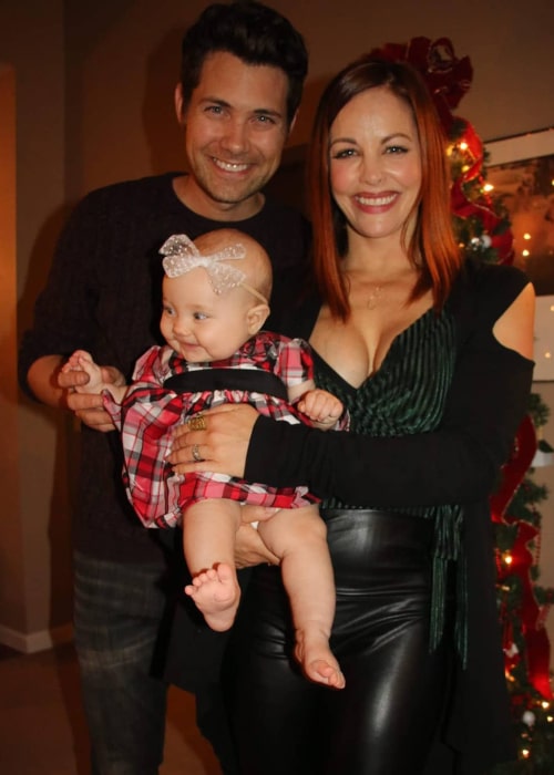 Drew Seeley and Amy Paffrath with their daughter, as seen in December 2019