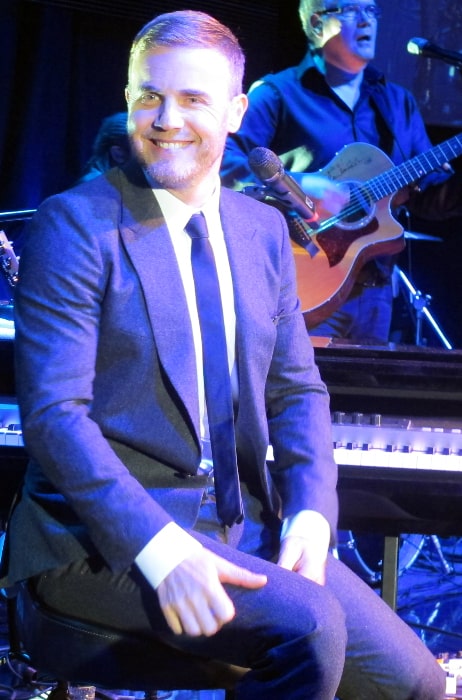 Gary Barlow pictured while performing in concert in 2013