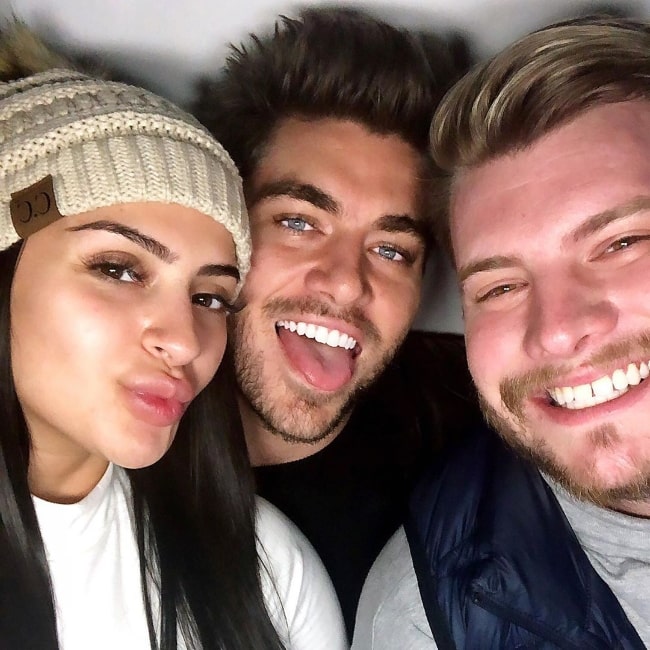 Gus Smyrnios (Center) as seen while smiling in a selfie along with Nilsa Prowant and Codi Butts at New York City Times Square in November 2019