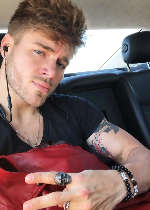 Gus Smyrnios as seen while clicking a car selfie in London, United Kingdom in April 2019