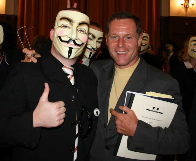 Jason Beghe (Right) posing for a picture with Anonymous at Hamburg conference on Scientology in September 2008