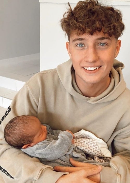 Jed Barker as seen while smiling in a picture along with his nephew in October 2019