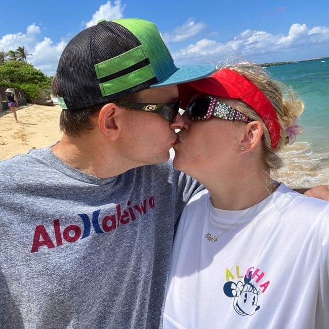 Kristine as seen in a selfie taken while sharing a romantic moment with her husband on the beach in May 2020
