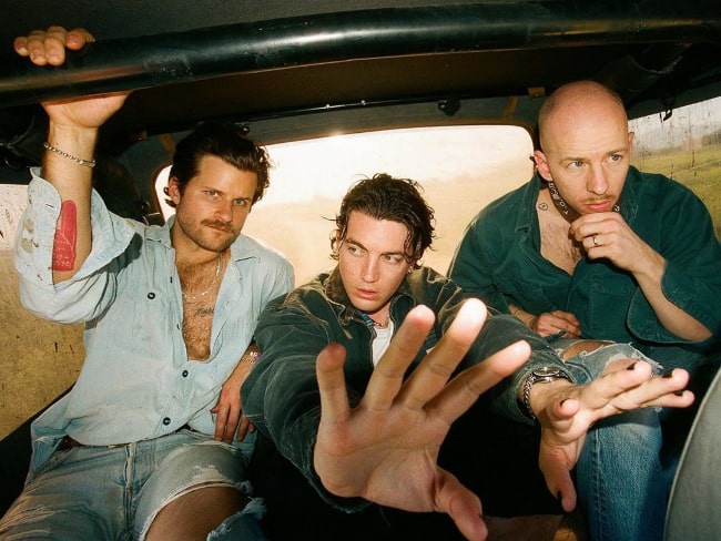 LANY members Jake Goss, Paul Klein, and Charles Priest