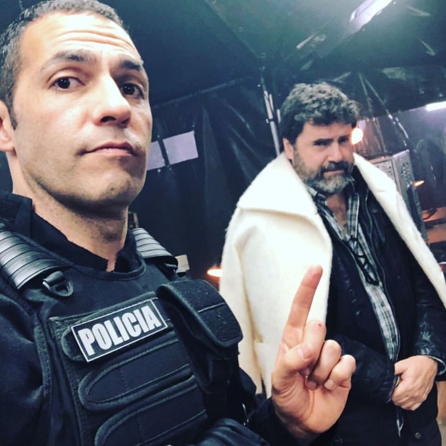 Mario de la Rosa as seen while taking a selfie with Fernando Soto in the background in September 2019