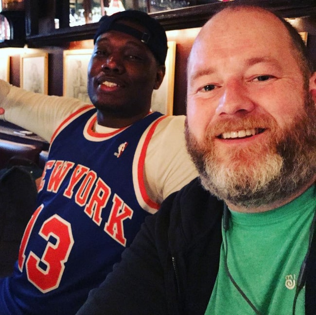 Michael Che (Left) as seen while smiling in a selfie alongside Sean Donnelly in August 2017