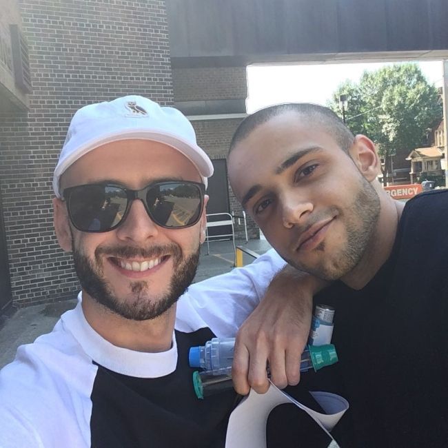 Noah Shebib taking a selfie with a fan in August 2017