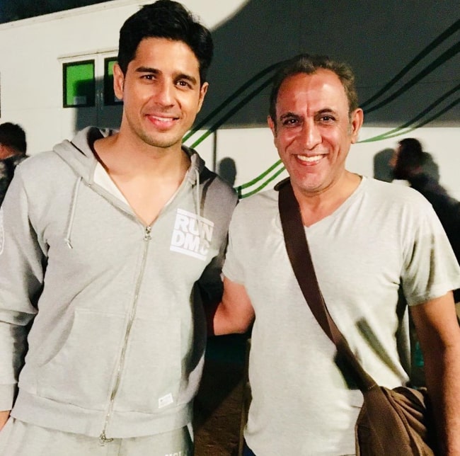 Pawan Chopra (Right) as seen while posing for a picture alongside Sidharth Malhotra in October 2019