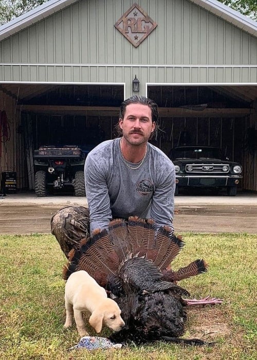 Riley Green as seen in a picture taken with his dog after going turkey hunting in Jacksonville, Alabama in April 2020
