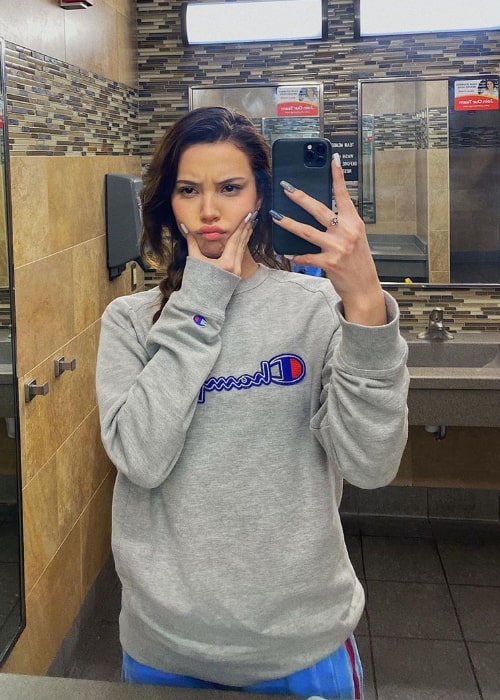 Romina Gafur as seen while taking a mirror selfie in March 2020