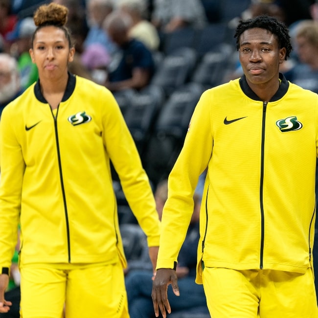 Seattle Storm players Natasha Howard (foreground) and Alysha Clark warming up in July 2019